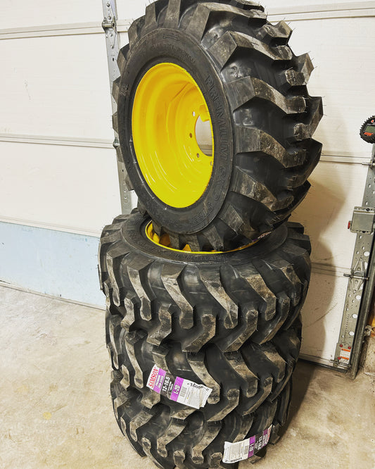 L220 Skid Steer Rim & Tire Set